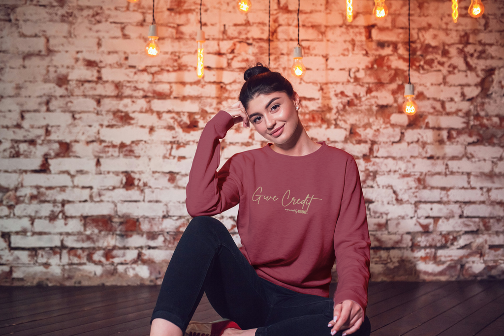 “GIVE CREDIT” SWEATSHIRT — CARDINAL RED